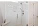 Close-up of glass shower with white herringbone tile and dual shower heads at 6304 Chadderton Circle, Myrtle Beach, SC 29579