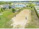 Community sand volleyball courts next to lake offering residents recreational activities and scenic views at 6304 Chadderton Circle, Myrtle Beach, SC 29579