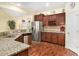 Modern kitchen with granite countertops, stainless steel appliances, and ample cabinet space at 632 Lafayette Park Dr., Little River, SC 29566