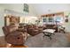 Open living room with ample seating, hardwood floors, and open concept at 632 Lafayette Park Dr., Little River, SC 29566