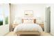 Bright bedroom with a cozy bed, stylish bedside tables, and plenty of natural light at 6335 Swainson Street Sw, Ocean Isle Beach, NC 28469