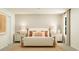 Serene bedroom with a panel accent wall, soft lighting, and coordinating nightstands at 6335 Swainson Street Sw, Ocean Isle Beach, NC 28469