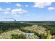 Beautiful aerial view of 637 Grand Cypress Way, the surrounding neighborhood, and Garden City Beach in the distance at 637 Grand Cypress Way, Murrells Inlet, SC 29576
