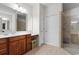Bathroom boasts double sinks, ample counter space, and walk-in shower at 637 Grand Cypress Way, Murrells Inlet, SC 29576