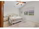 Bedroom with vaulted ceiling, and large window providing natural light at 637 Grand Cypress Way, Murrells Inlet, SC 29576