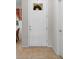 A bright entryway with tile flooring and a decorative glass panel in the front door at 637 Grand Cypress Way, Murrells Inlet, SC 29576