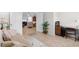 Inviting living room features tile floors and an open doorway to other rooms at 637 Grand Cypress Way, Murrells Inlet, SC 29576