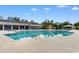 Enjoy the sunshine in the community's outdoor pool and lounge area, surrounded by manicured landscaping at 637 Grand Cypress Way, Murrells Inlet, SC 29576