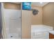 Bright bathroom featuring a shower/tub combination and a separate soaking tub for ultimate relaxation at 704 S Ocean Blvd. # 304A, Myrtle Beach, SC 29577