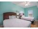 Bright and airy bedroom featuring two comfortable beds and ample natural light at 704 S Ocean Blvd. # 304A, Myrtle Beach, SC 29577