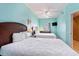 Bright bedroom features two beds, tv, ceiling fan, and coastal decorations at 704 S Ocean Blvd. # 304A, Myrtle Beach, SC 29577
