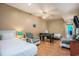Spacious bedroom features two beds, a foosball table, and hardwood floors at 704 S Ocean Blvd. # 304A, Myrtle Beach, SC 29577