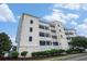 Exterior of Myrtle Beach Villas II. Beautiful building with balconies and curb appeal at 704 S Ocean Blvd. # 304A, Myrtle Beach, SC 29577