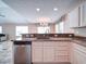 Stylish kitchen with a stainless steel dishwasher, granite countertops, and an open layout at 708 Shenanigan Loop, Murrells Inlet, SC 29576