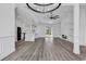 Open concept living area featuring a fireplace, modern kitchen, and sliding glass doors to outdoor area at 729 Jade Dr., Myrtle Beach, SC 29579