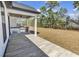 Covered outdoor kitchen with stainless steel grill, sink, and space for entertaining at 729 Jade Dr., Myrtle Beach, SC 29579