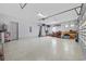 Spacious garage with epoxy flooring, ample storage, and an abundance of workspace at 7961 San Marcello Dr., Myrtle Beach, SC 29579