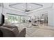 Bright open-concept living room flows into a chef-inspired kitchen with modern appliances at 7961 San Marcello Dr., Myrtle Beach, SC 29579