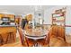 Cozy dining area features a wooden table, chairs, and built-in hutch for convenient storage and display at 809 Berrywood Ct., Myrtle Beach, SC 29588