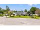 Well-maintained single Gathering home with manicured lawn, mature trees, and RV storage area at 809 Berrywood Ct., Myrtle Beach, SC 29588