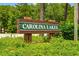 Entrance sign to the Carolina Lakes community surrounded by lush greenery at 809 Berrywood Ct., Myrtle Beach, SC 29588