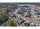 Aerial view of the community featuring the home's prime location near green spaces and a tranquil pond at 865 Summer Starling Pl., Myrtle Beach, SC 29577