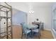 The dining room boasts a modern chandelier, and stylish furnishings at 865 Summer Starling Pl., Myrtle Beach, SC 29577