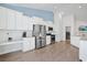 The kitchen features stainless steel appliances, granite countertops, and a breakfast bar at 865 Summer Starling Pl., Myrtle Beach, SC 29577