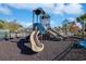A colorful community playground features slides, climbing structures, and a safe, cushioned ground surface for children at 865 Summer Starling Pl., Myrtle Beach, SC 29577