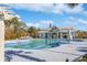Large community pool features ample deck space, lounge chairs, and lush landscaping, perfect for summer relaxation and recreation at 865 Summer Starling Pl., Myrtle Beach, SC 29577