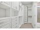 Walk-in closet with built-in shelving and drawers, providing ample storage space at 865 Summer Starling Pl., Myrtle Beach, SC 29577