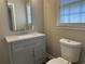 A stylish bathroom with a modern vanity and granite countertop at 876 S Clay Field Rd, Johnsonville, SC 29555