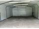 Interior of a metal outdoor structure with a concrete floor and metal framing at 876 S Clay Field Rd, Johnsonville, SC 29555