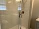 Modern bathroom with subway tile shower featuring glass doors and chrome fixtures at 876 S Clay Field Rd, Johnsonville, SC 29555