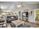 Comfortable living room showcasing vaulted ceilings, an entertainment center, and modern decor at 901 West Port Dr. # 712, North Myrtle Beach, SC 29582