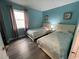 Serene bedroom featuring two twin beds, soft colors, and ample natural light at 920 N Waccamaw Dr. # 2206, Garden City Beach, SC 29576