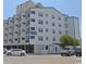 Exterior view of the building with multiple balconies for a resort vibe at 920 N Waccamaw Dr. # 2206, Garden City Beach, SC 29576