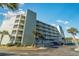 Sands Beach Club exterior featuring many floors, balconies, manicured landscaping and accessibility ramps at 9400 Shore Dr. # 411, Myrtle Beach, SC 29572