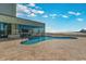 Breathtaking outdoor pool deck with ocean views, featuring a sparkling pool, a spacious deck, and comfortable lounging areas at 9400 Shore Dr. # 411, Myrtle Beach, SC 29572