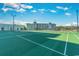Well-maintained tennis court offering a smooth playing surface, ample lighting, and access to nearby amenities and beautiful views at 9400 Shore Dr. # 411, Myrtle Beach, SC 29572