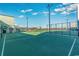 Professional-grade tennis court offering a smooth playing surface, ample lighting, and convenient access to nearby amenities at 9400 Shore Dr. # 411, Myrtle Beach, SC 29572