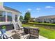 Charming backyard patio with scenic canal views, perfect for relaxing and entertaining outdoors at 9466 Old Palmetto Dr., Murrells Inlet, SC 29576