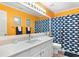 Bright bathroom featuring a white vanity, quartz countertops, and an updated shower curtain at 9466 Old Palmetto Dr., Murrells Inlet, SC 29576