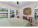 Comfortable bedroom with natural light, decor, and a ceiling fan for a relaxing atmosphere at 9466 Old Palmetto Dr., Murrells Inlet, SC 29576