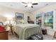 Charming bedroom with great natural light and cozy decor, window views of the outdoors at 9466 Old Palmetto Dr., Murrells Inlet, SC 29576