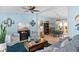 Bright and airy living room with a fireplace, comfortable seating, and an open layout at 9466 Old Palmetto Dr., Murrells Inlet, SC 29576