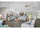 Spacious living room with cozy seating arrangements, a fireplace, and plenty of natural light at 9466 Old Palmetto Dr., Murrells Inlet, SC 29576
