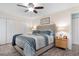 Spacious main bedroom with ceiling fan and ample closet space with a king bed at 9466 Old Palmetto Dr., Murrells Inlet, SC 29576