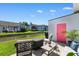 Inviting patio with comfortable seating overlooking the serene canal views and manicured lawn at 9466 Old Palmetto Dr., Murrells Inlet, SC 29576