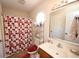 Bathroom with a shower-tub, vanity, and neutral decor at 950 Tiffany Ln., North Myrtle Beach, SC 29582
